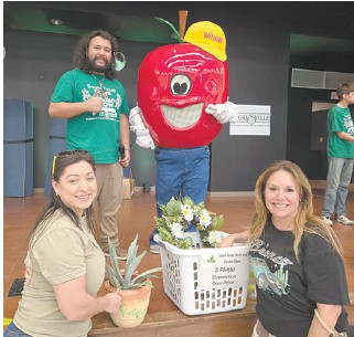 Floresville Event Center Manager Celina Guerrero (right) and Event Center Assistant Ruth Veliz, 3 p.m. winners, prize basket A