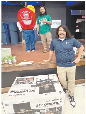 Andrew Tieu of San Antonio is the winner of the barbecue grill, donated by event vendor H-E-B.