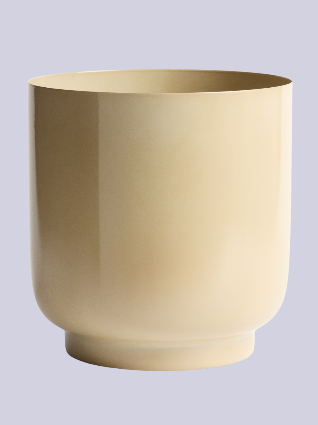 A beige metal plant pot from H&amp;M