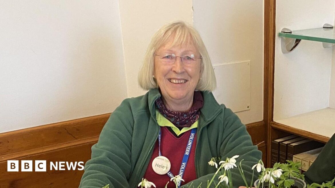 Reigate’s Gatton Park celebrates 30 years of volunteer work A woman sat in front of a plant on a table.