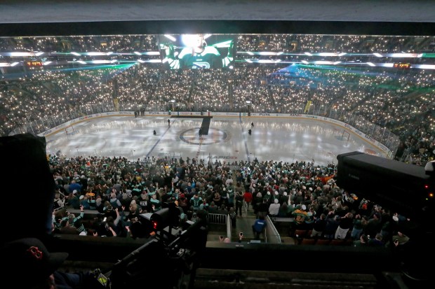 The TD Garden lights up as Boston and Montreal take to the ice for the PWHL game before a sellout crowd. (Staff photo by Stuart Cahill/Boston Herald)