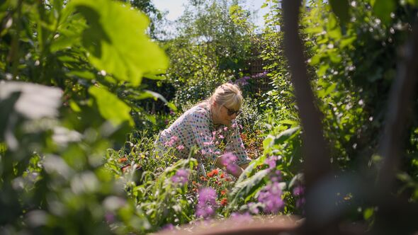 Louise Vergette tends her plot in Secret Garden.