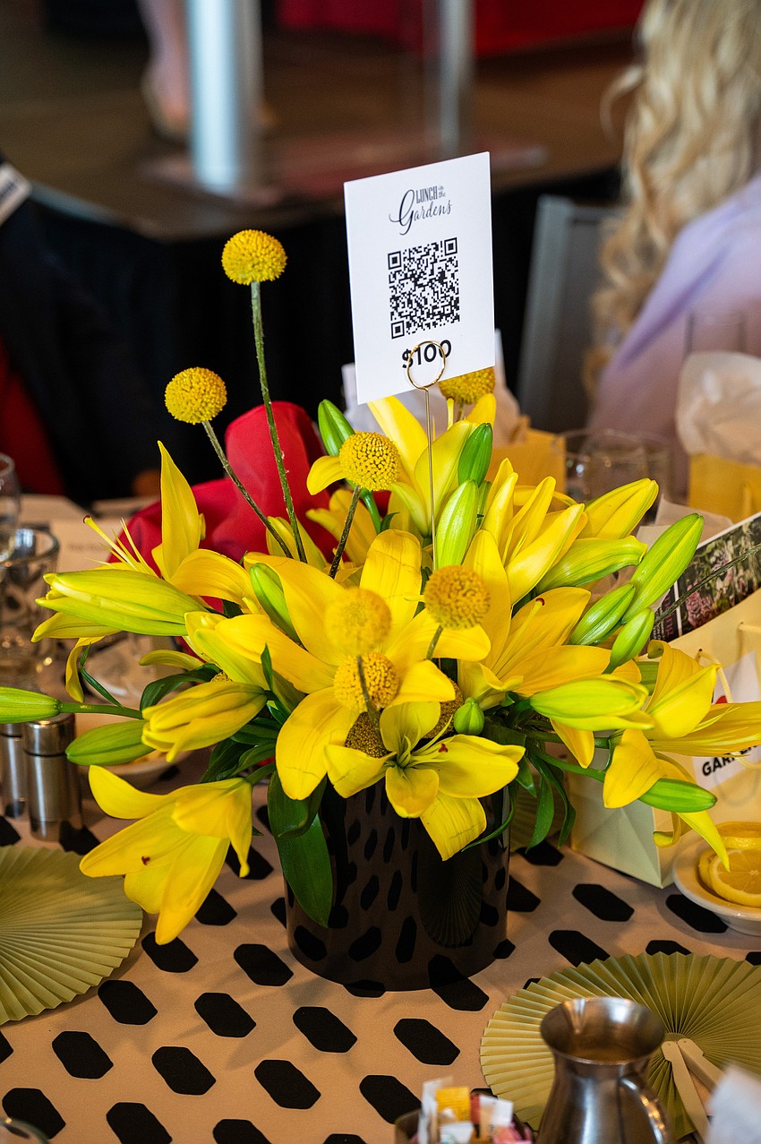 Floral centerpieces graced all the tables. Floral centerpieces graced all the tables.