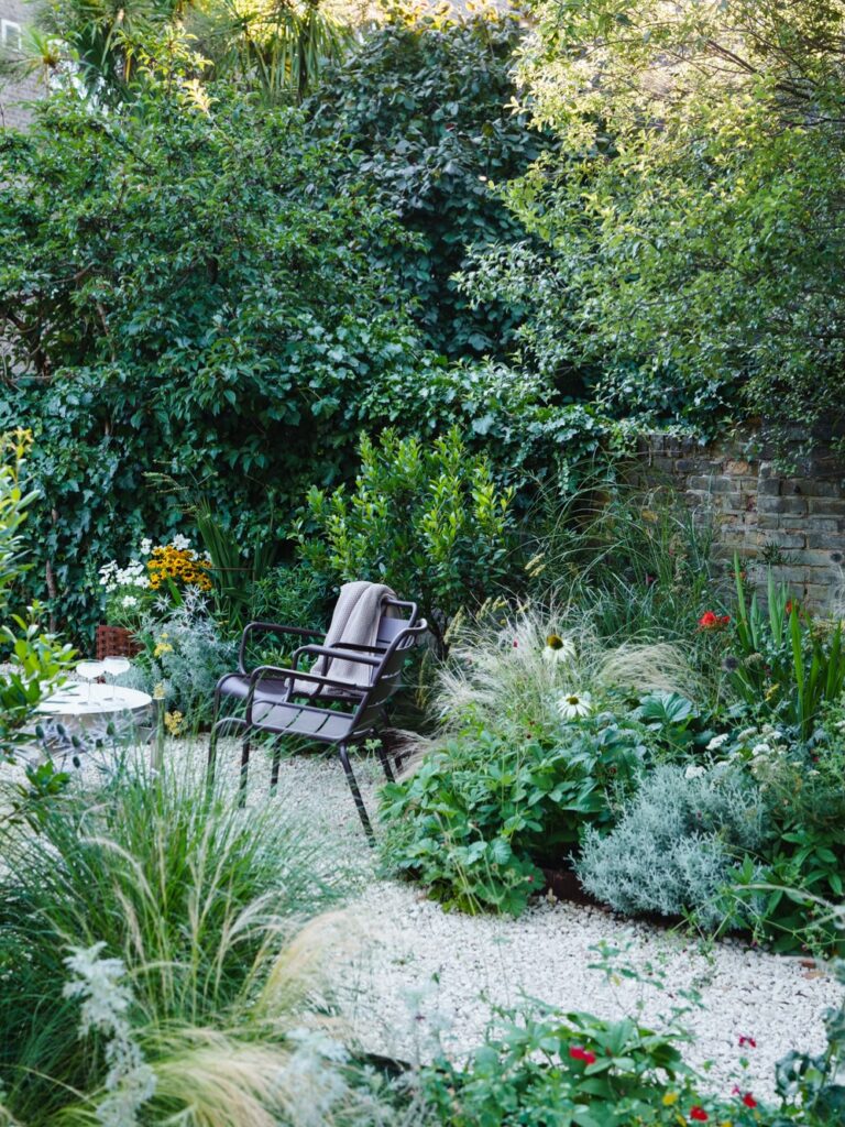 26 Whimsical Garden Ideas for 2026 That Make You Keep Looking for What You Missed Garden Shed Glow by the Water