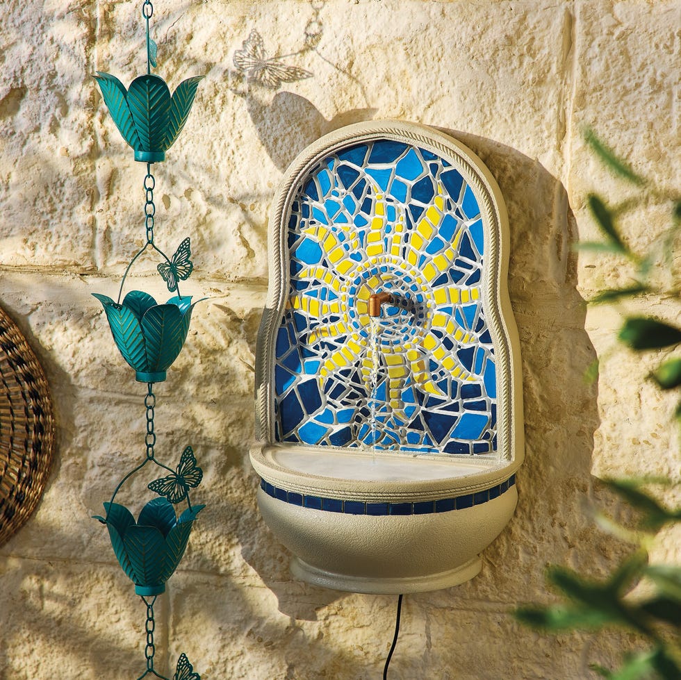 Mosaic wall fountain with decorative elements mosaic wall fountain with decorative elements
