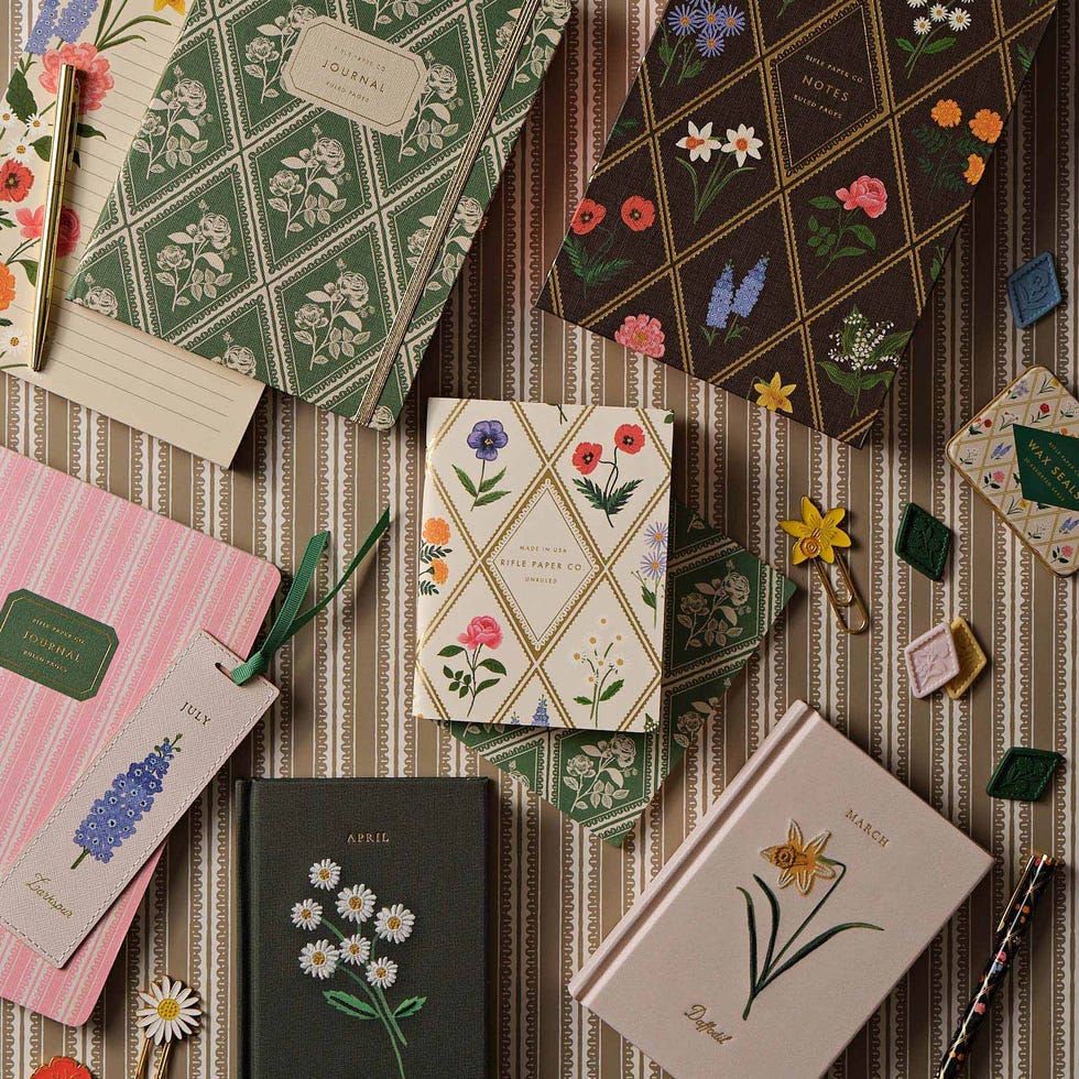 Collection of decorative notebooks and stationery items. Collection of decorative notebooks and stationery items.