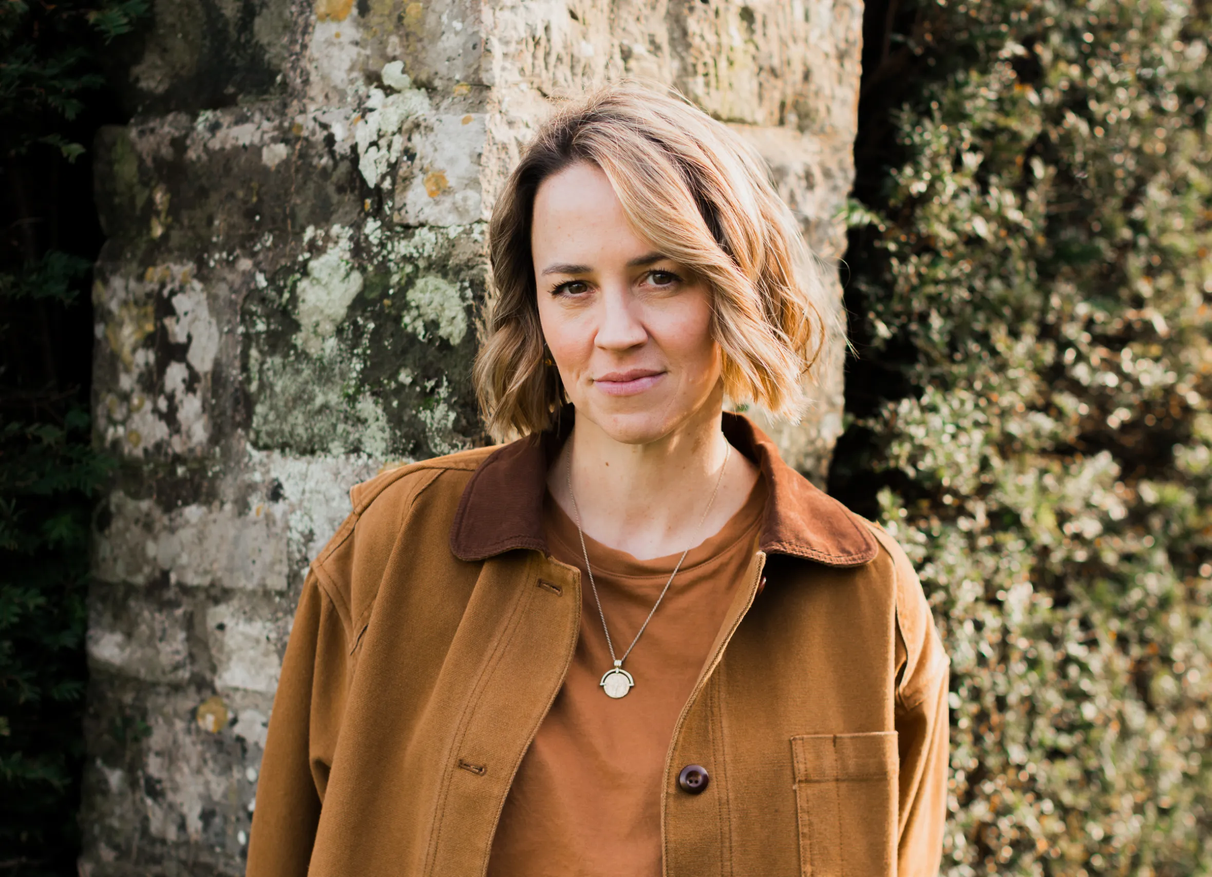 Pollyanna Wilkinson in a brown jacket.
