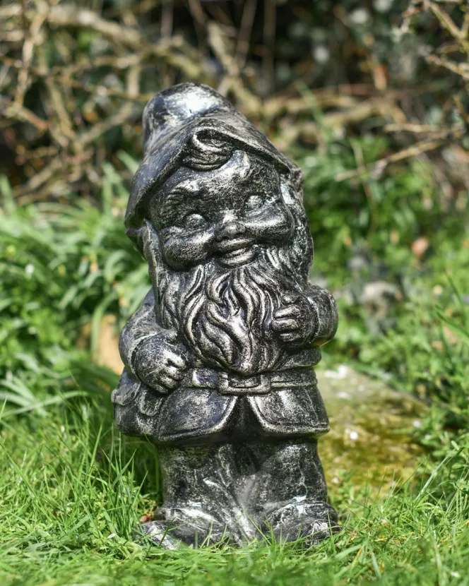 A silver-brushed garden gnome made from recycled aluminum.