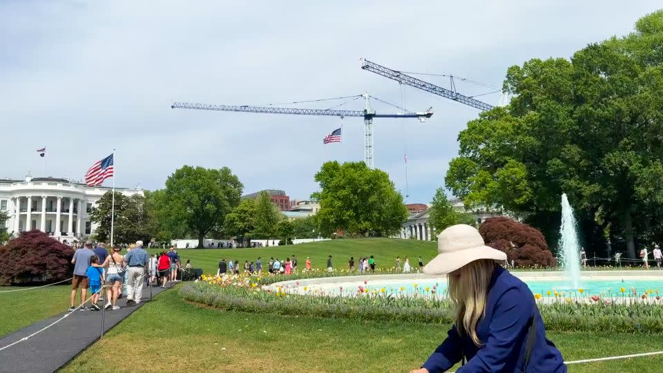 Visitors pass the South Fountain toward the end of the White House 2026 Spring Garden Tour on Saturday, April 18, 2026 in Washington, DC. - Riane Lumer/CNN