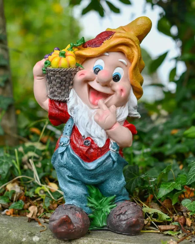 Resin garden gnome Rorrin carrying a basket of vegetables.
