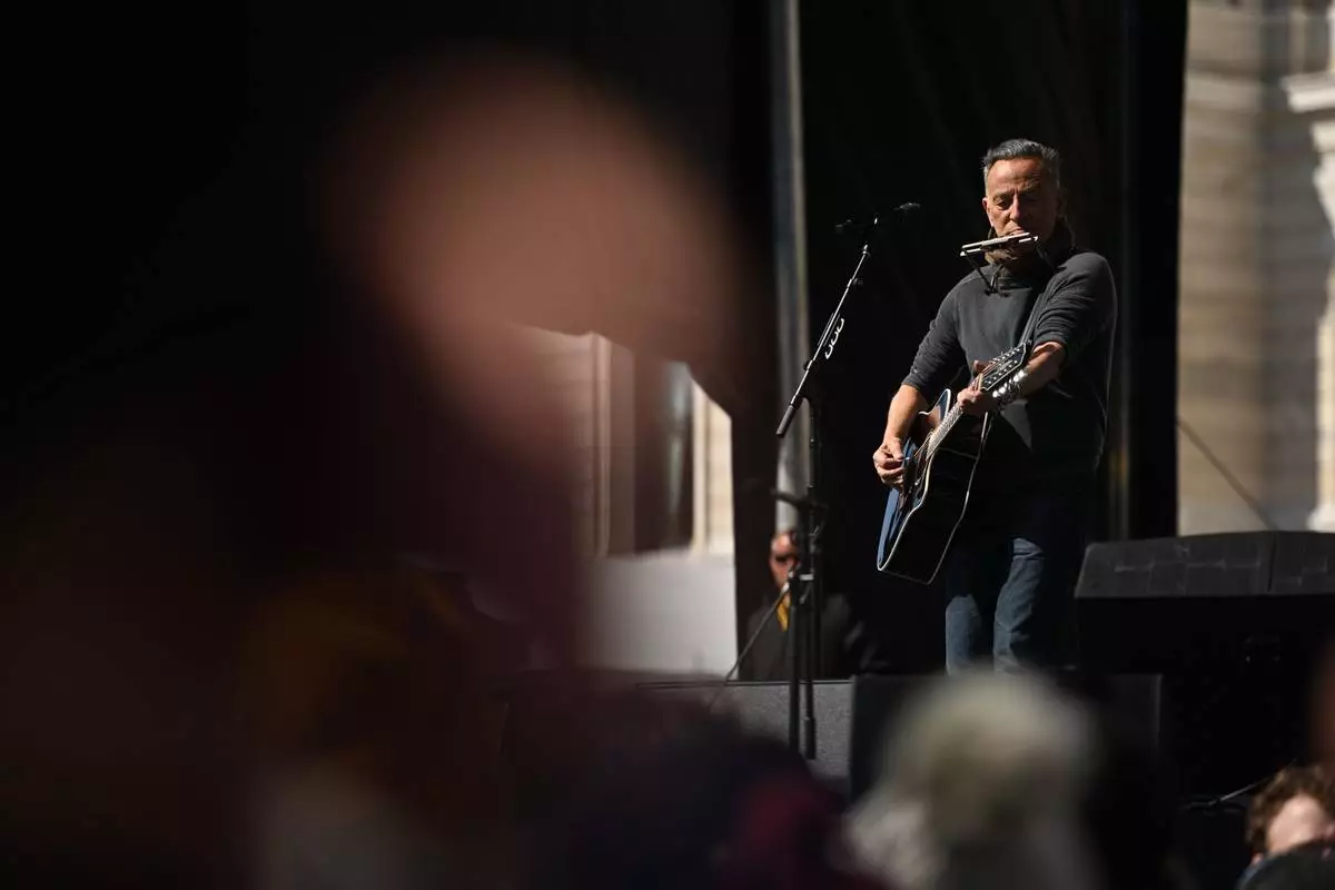 Bruce Springsteen performs during tthe "No Kings" protest Saturday, March 28, 2026, in St. Paul, Minn. (AP Photo/Tom Baker)