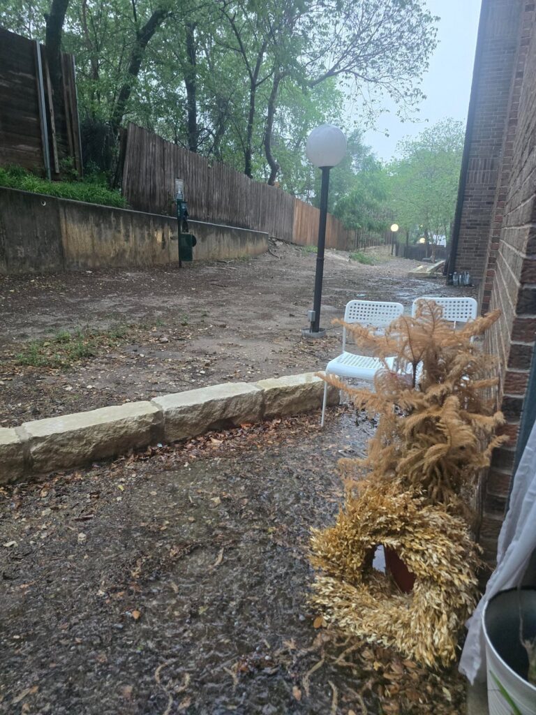 Solution for flooding apartment "lawn"?