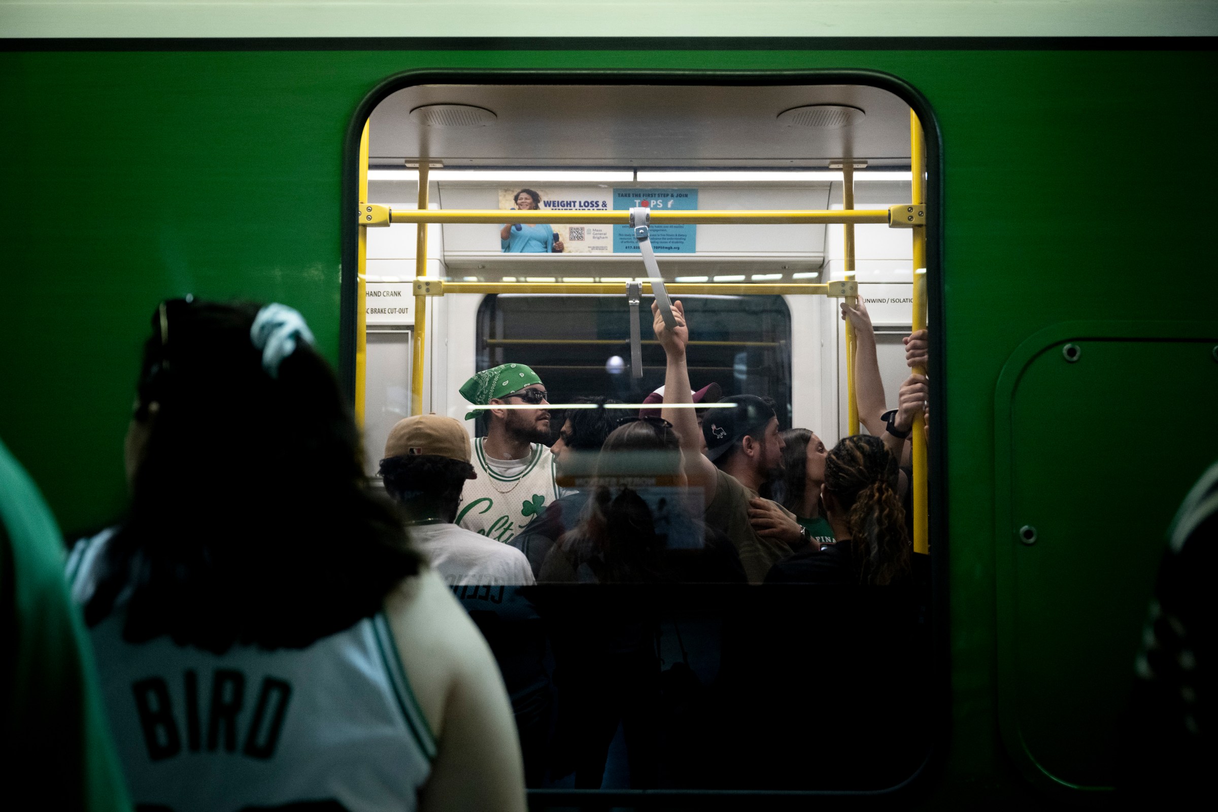 BOSTON, MASSACHUSETTS - JUNE 21: Fans board the T at North Station during the Boston Celtics Victory Parade following their 2024 NBA Finals win at TD Garden on June 21, 2024 in Boston, Massachusetts. (Photo by Maddie Malhotra/Getty Images)
