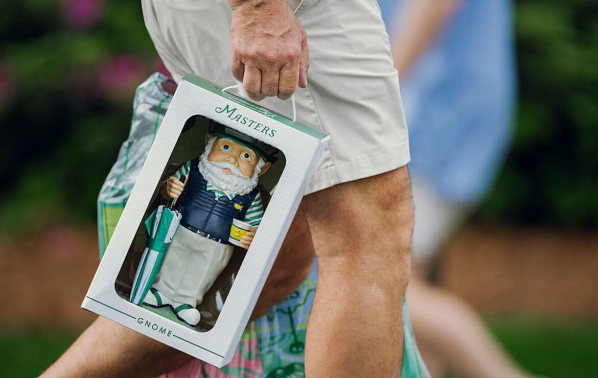 How a Garden Gnome Became the Masters’ Hottest Souvenir – Garden & Gun A person carries a garden gnome in a box