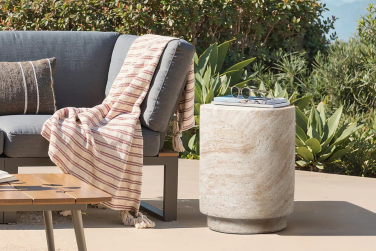 Sculptural rock side table outside near couch