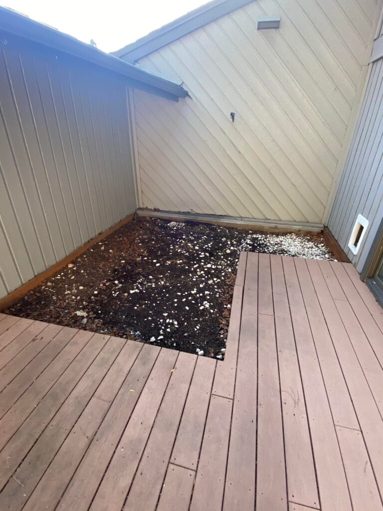 What should I do with awkward area between deck and house What should I do with awkward area between deck and house