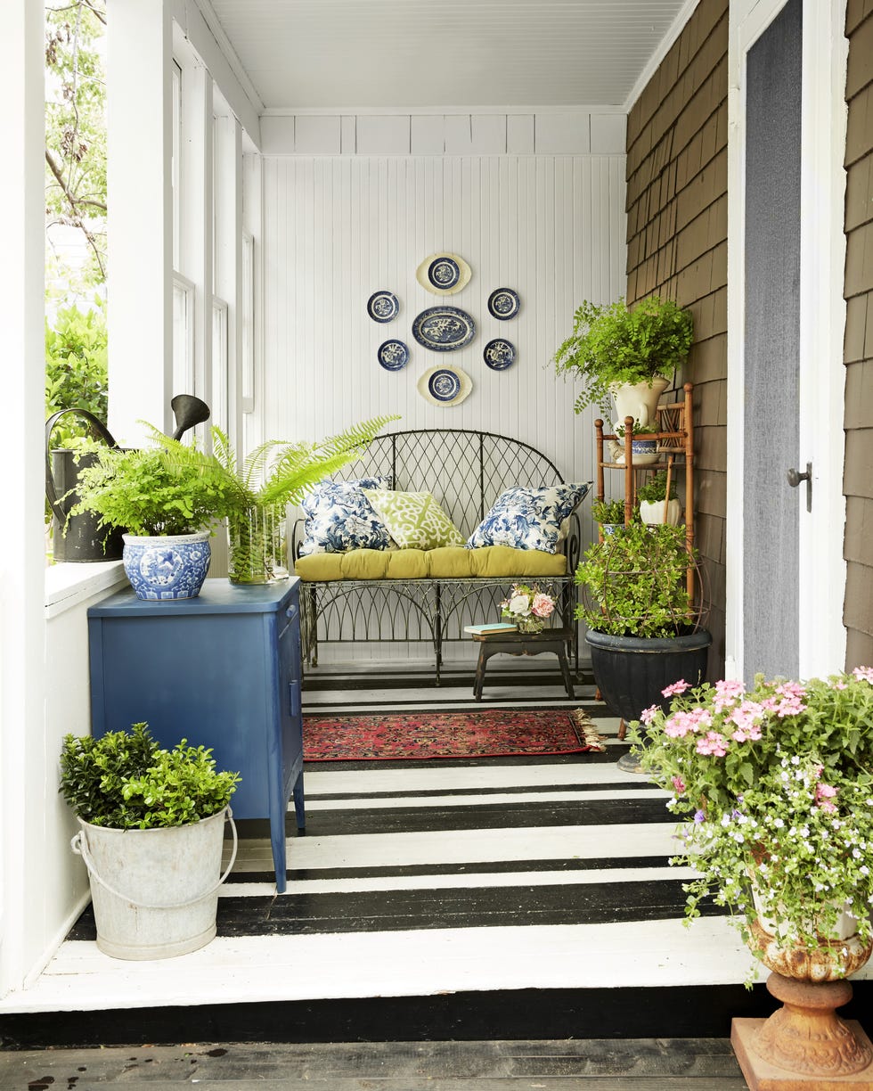 porch with painted floors in a black and white stripe pattern