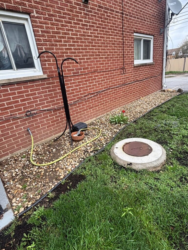 How would you make this rock bed area look pretty with minimal effort and a low budget? 6A gardening zone. How would you make this rock bed area look pretty with minimal effort and a low budget? 6A gardening zone.