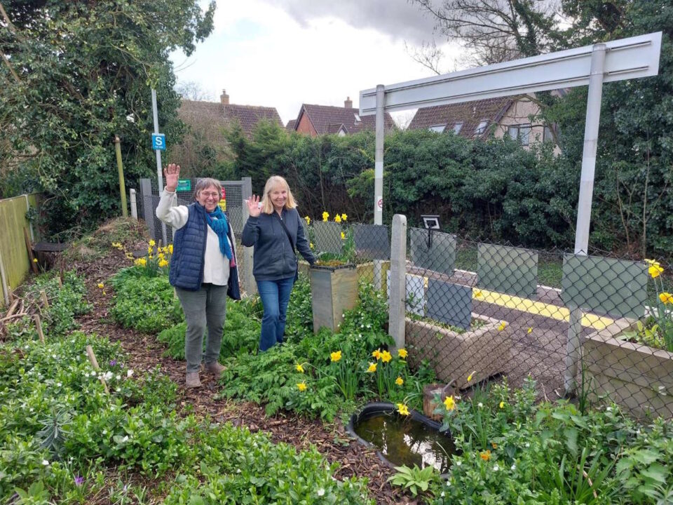 Station Adopters in the Community garden at Bures railway station. // Credit: Greater Anglia