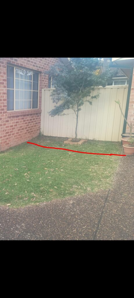 Organic Mulch Against Brock Home