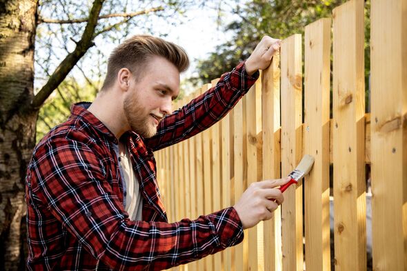 Young man doing home improvements. Young man doing home improvements.