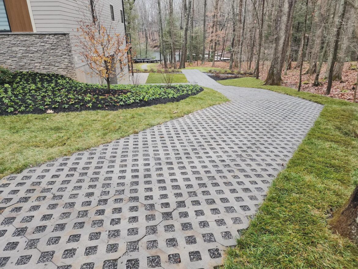 Has anyone used this type of paver? I'm considering it for the area up to and around my shed that doesn't get enough sun for grass growth and it's too expensive to just concrete. How easy/difficult is this to manage with weed n such?