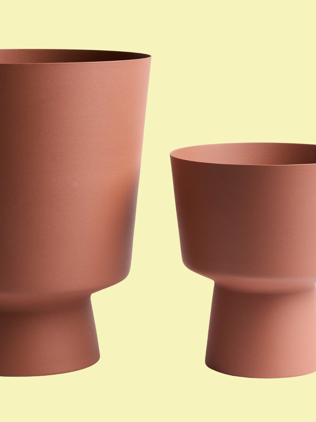 A set of two metal terracotta plant pots from H&amp;M