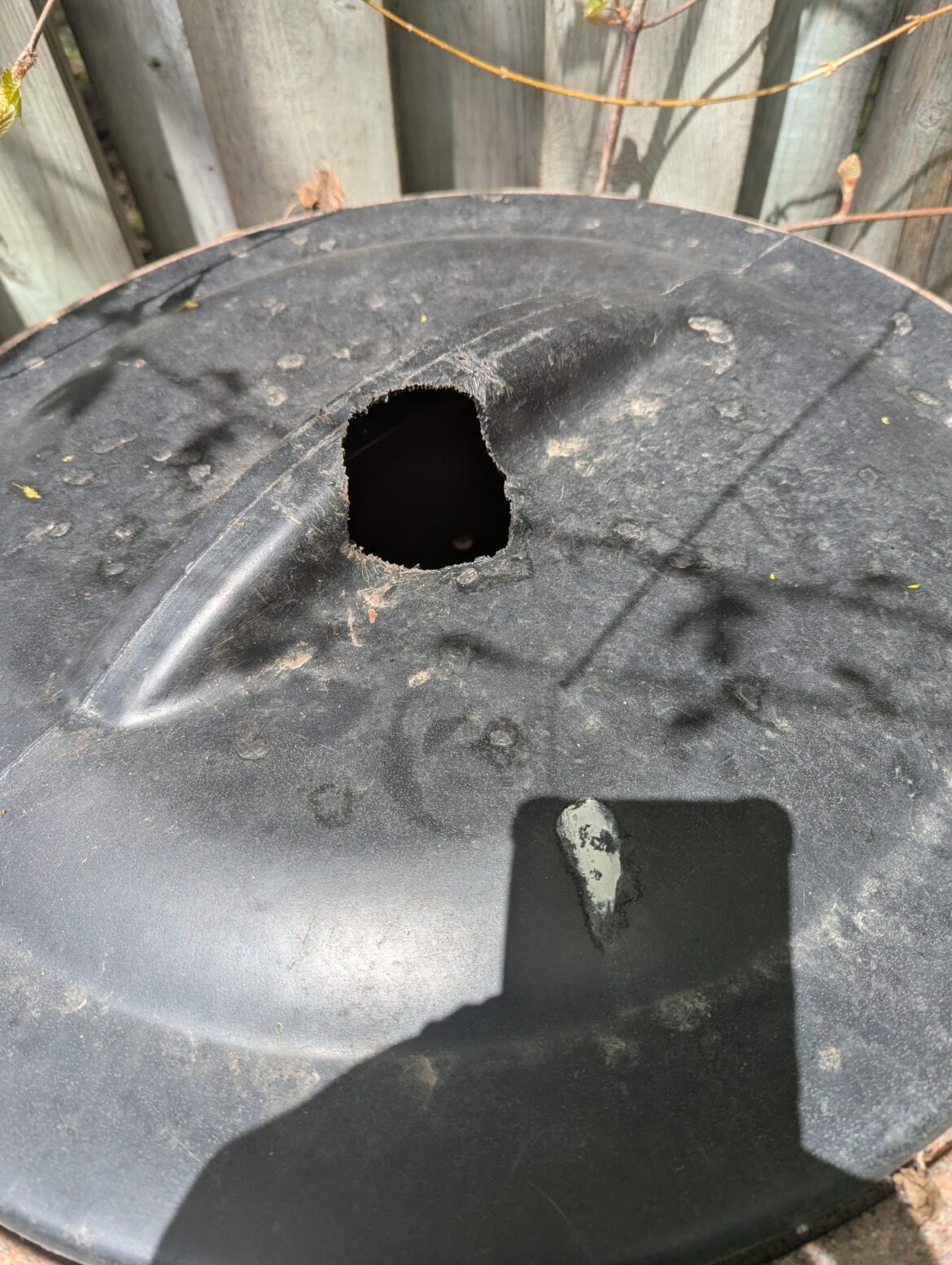 I don't want to throw this compost bin out. Is there any way to repair this lid? I think I have the most persistent squirrels.