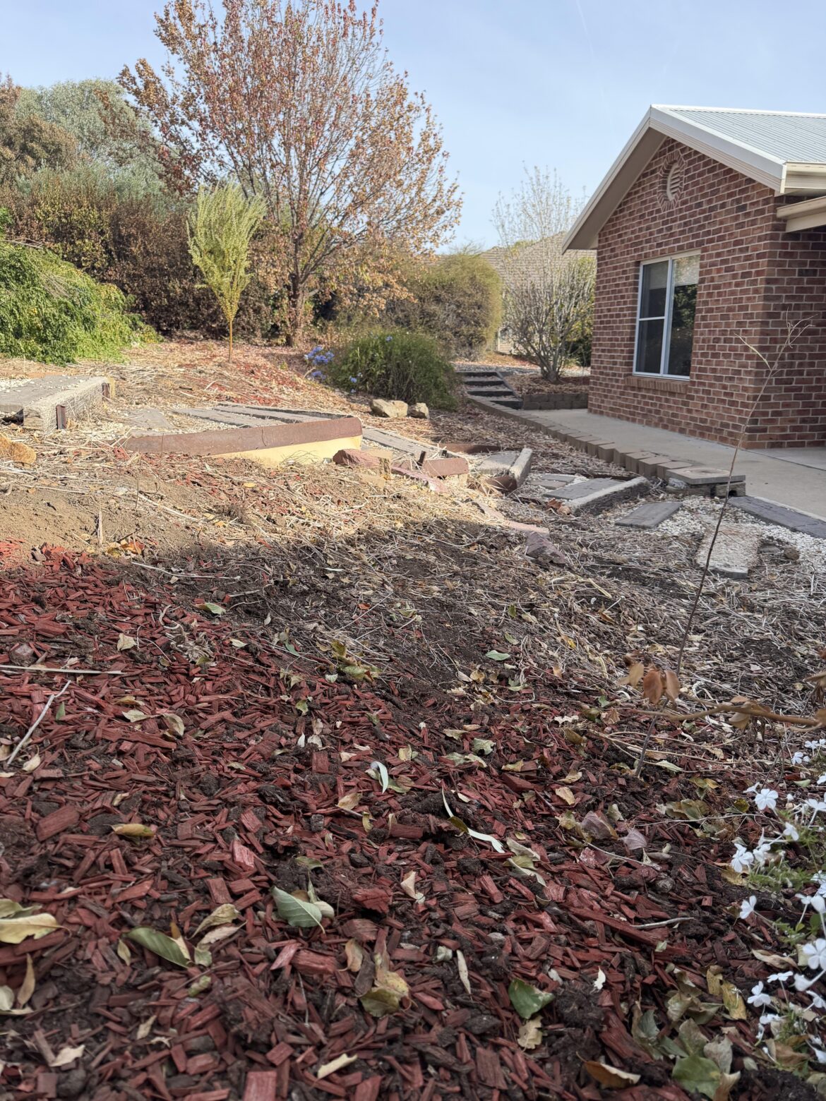 How to improve slope in our front garden? How to improve slope in our front garden?