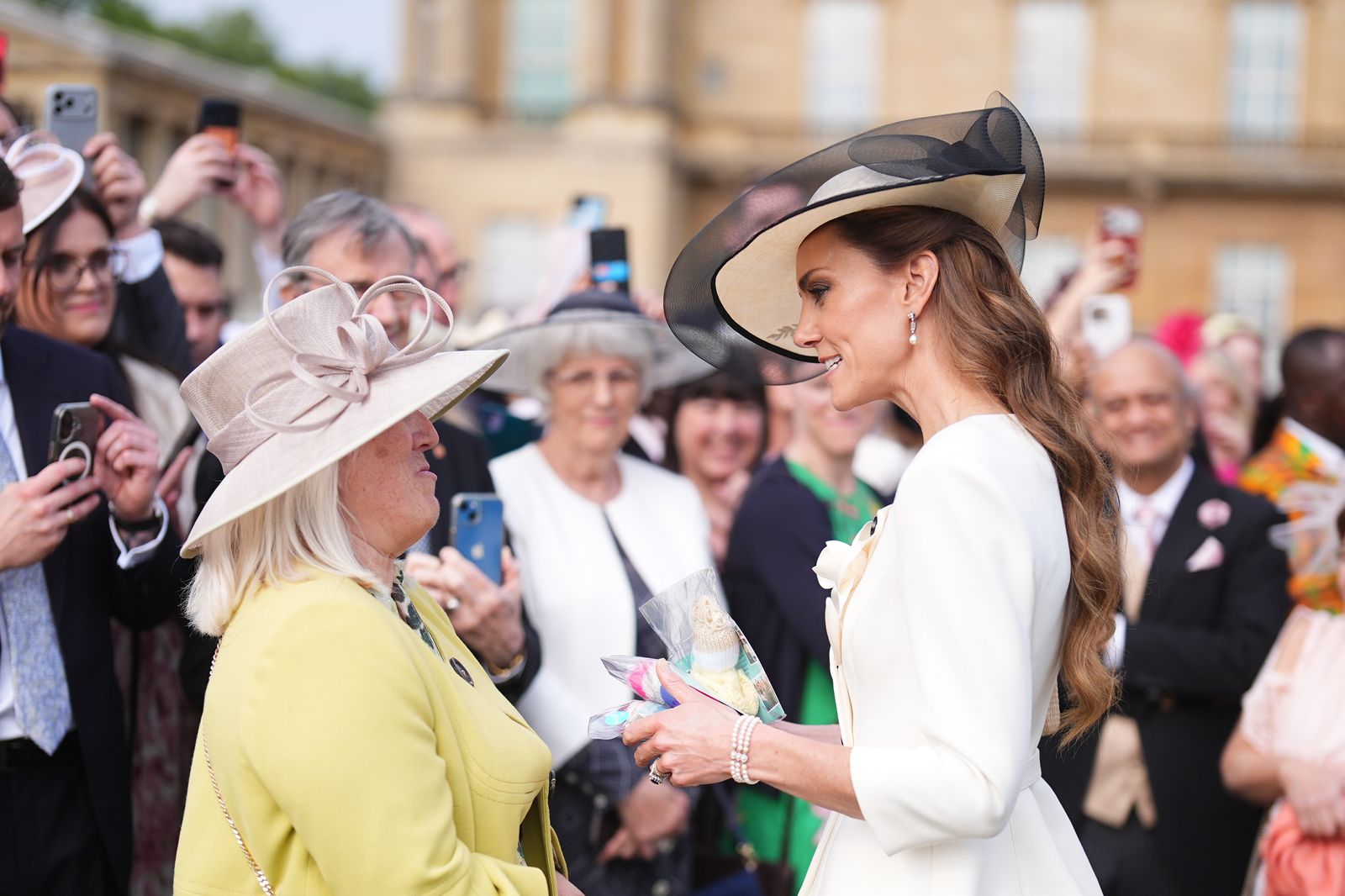 LONDON ENGLAND  MAY 8 Catherine Princess of Wales meets guests during a Royal Garden Party at Buckingham Palace on May 8...