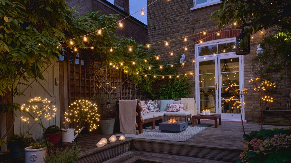 small garden with atmospheric garden including festoon lights