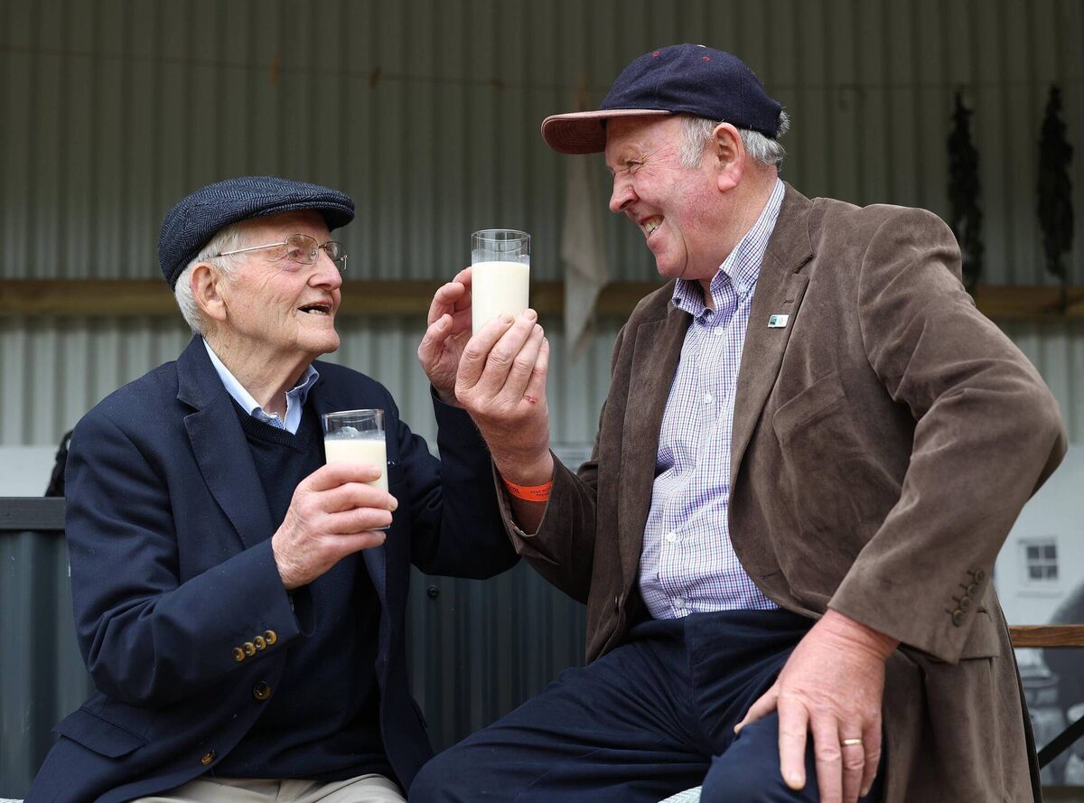 Michael O'Kelly, from Drumcollogher, Co Limerick, and John Flaherty, from Cordal, Castleisland, Co Kerry, pictured ahead of inspecting milk before a panel discussion on 60 Years of Dairy Farming in Ireland at the National Dairy Council Garden at Bord Bia Bloom in 2024. Picture: Robbie Reynolds
