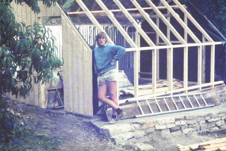David Holmgren building a greenhouse in Hobart in 1978.