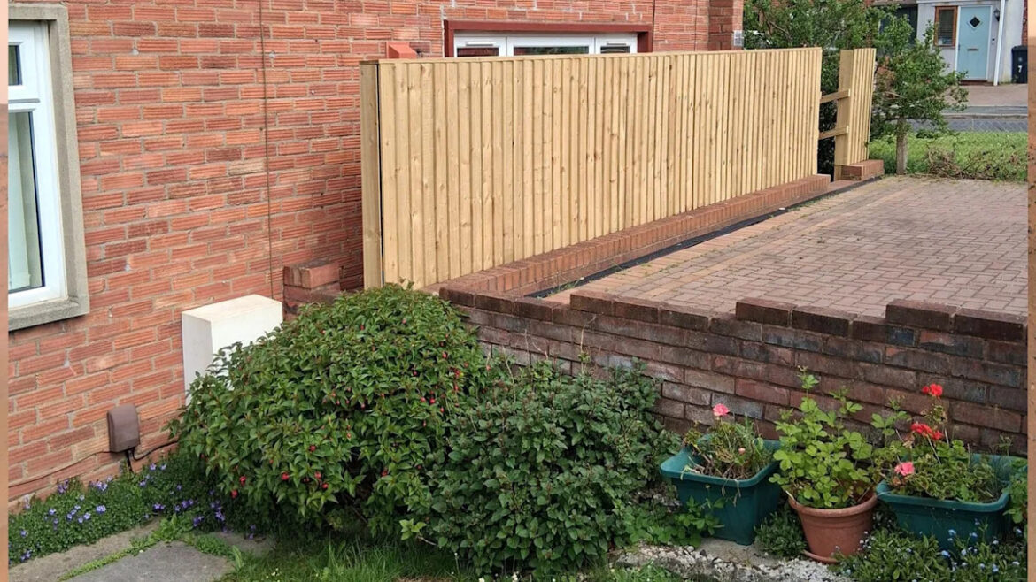 Neighbours baffled after garden fence installed across living room window
