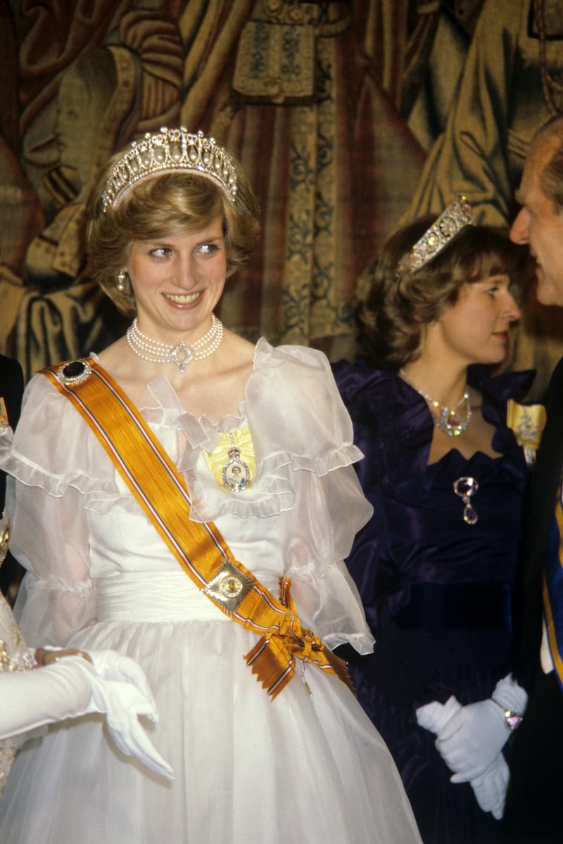 The Princess of Wales at a banquet for the British royal family given by Queen Beatrix and Prince Claus of the Netherlands at Hampton Court Palace.