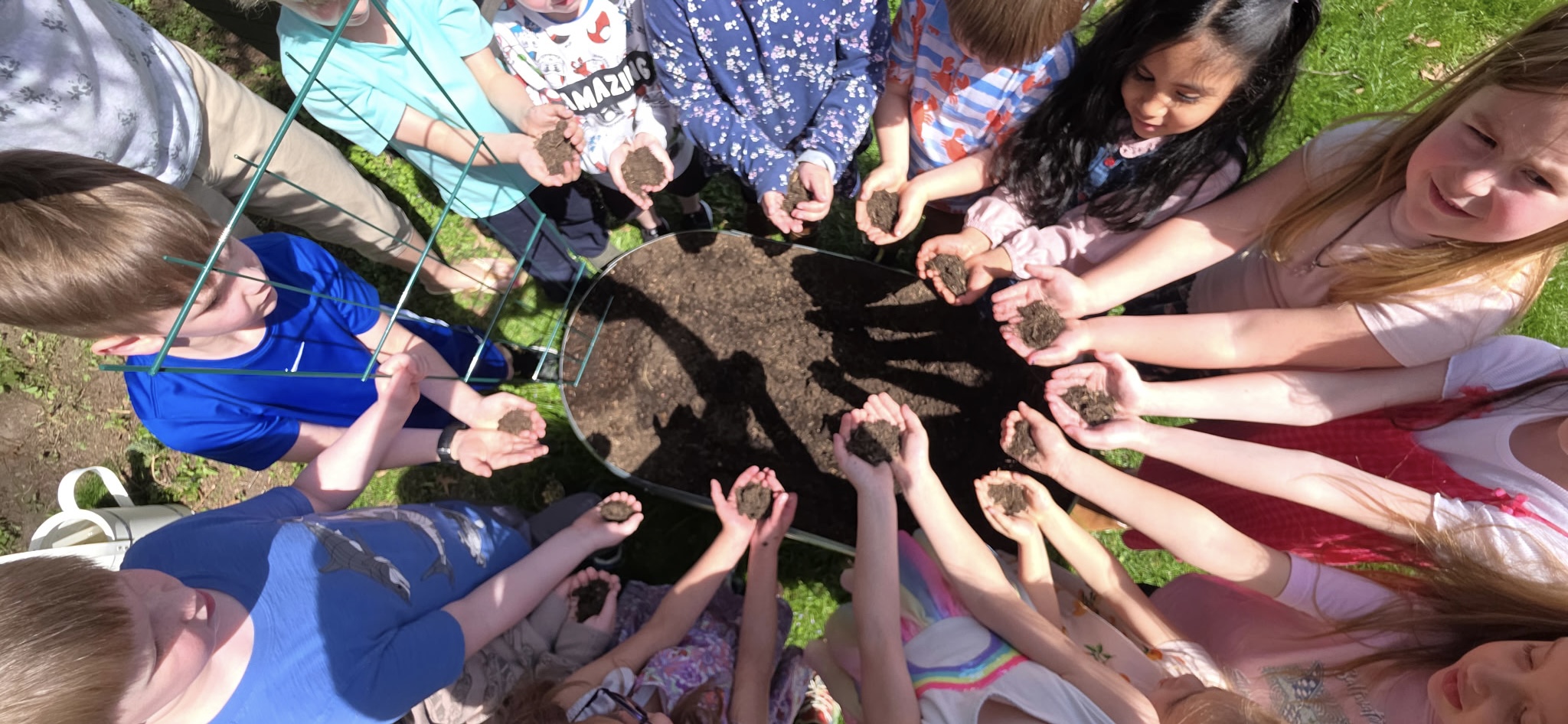 Jenny Lynn students work with Jayanne Czerniakowski on their school...