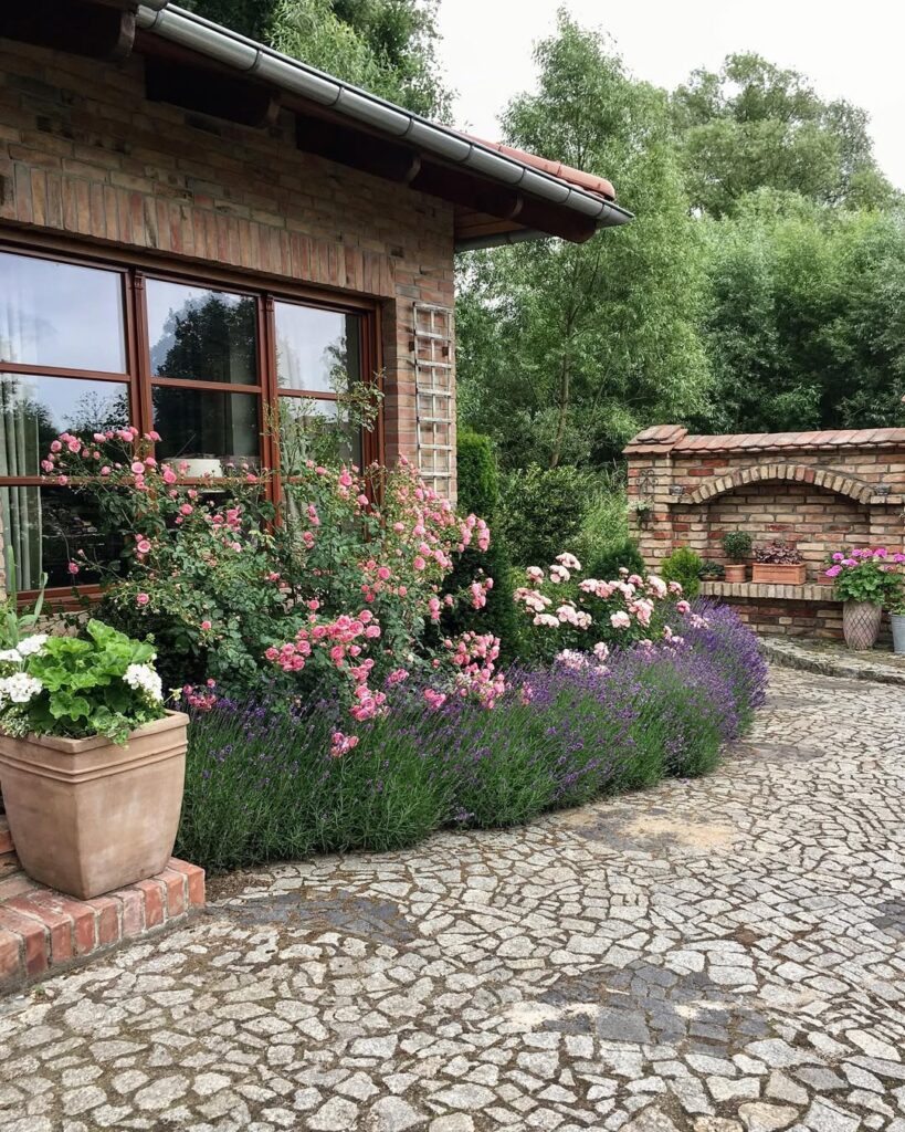 28 Rustic Garden Ideas for 2026 That Make Your Yard Look Better Without Spending Much Structured Courtyard Garden with Gravel and Terracotta Planters