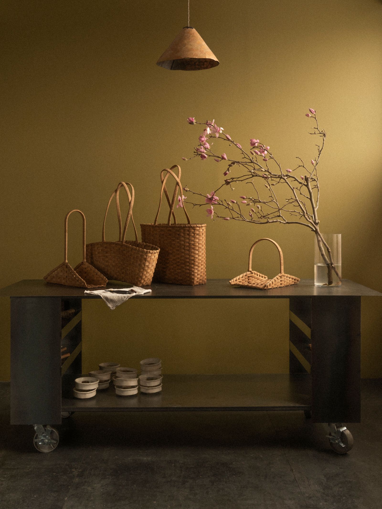 Image may contain Furniture Table Lamp Accessories Bag Handbag Flower Flower Arrangement Plant Desk and Art