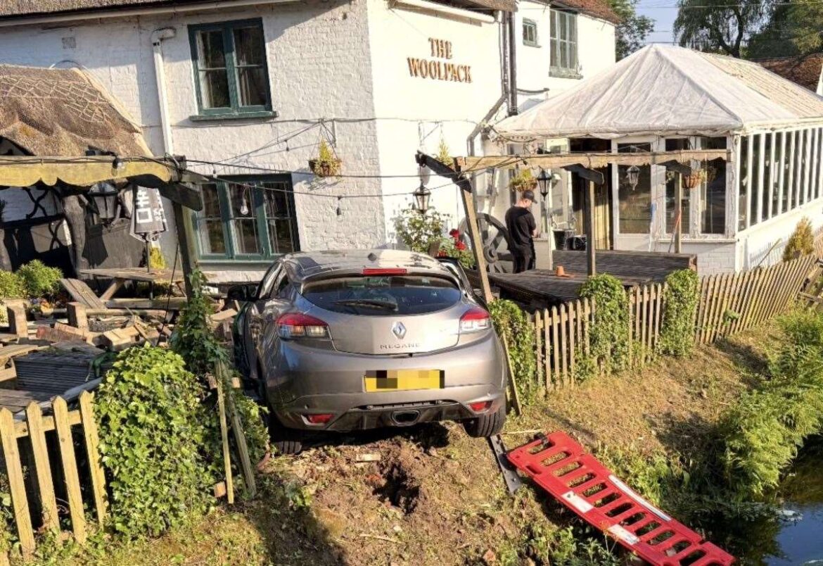 VIDEO: Police arrest two Bournemouth men after car jumps Sopley Brook, ploughs through fence and lands in The Woolpack pub garden VIDEO: Police arrest two Bournemouth men after car jumps Sopley Brook, ploughs through fence and lands in The Woolpack pub garden
