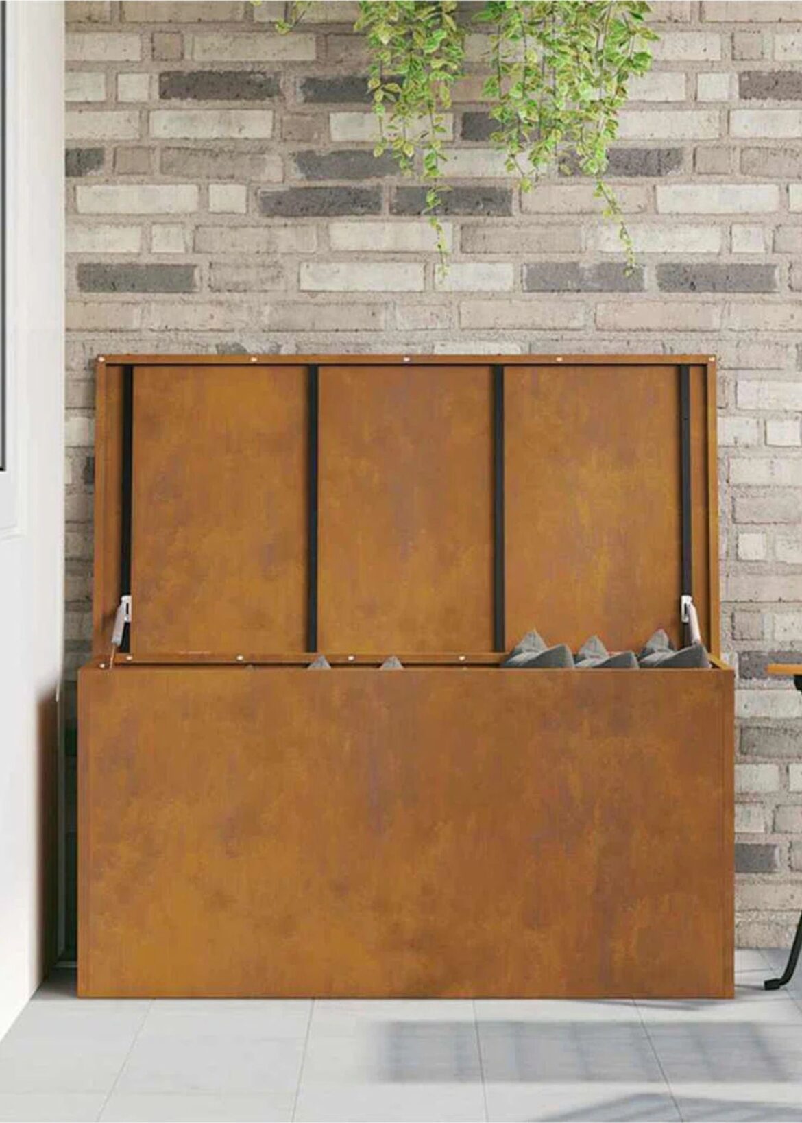 This Weathered Steel Chest Stores Outdoor Cushions in Style | This Weathered Steel Chest Stores Outdoor Cushions in Style |