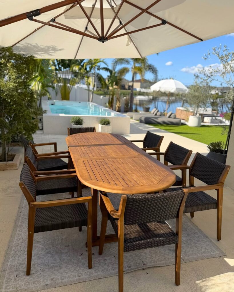 Deck Dining Under Striped Umbrella with Natural Accents