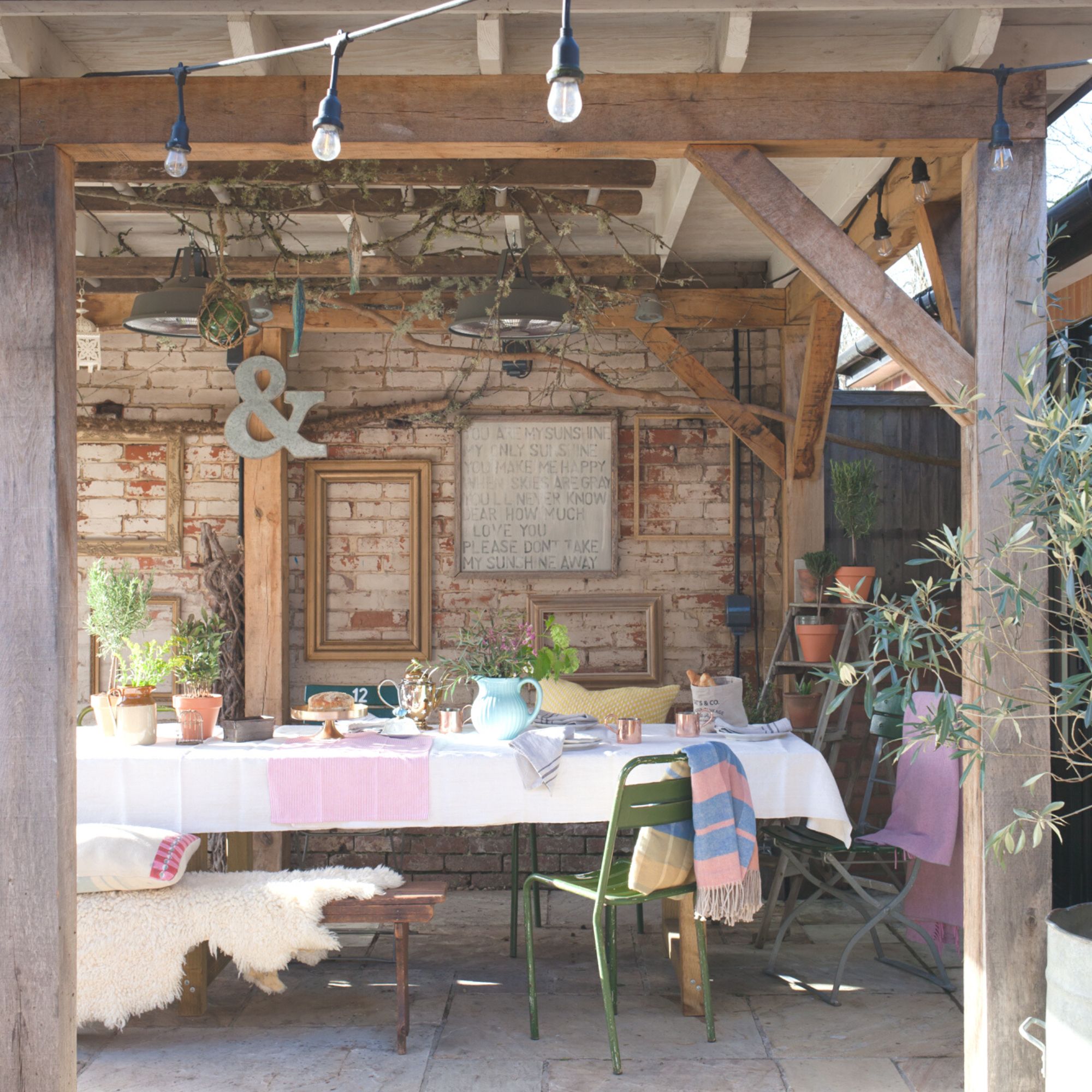 pergola over patio area with seating