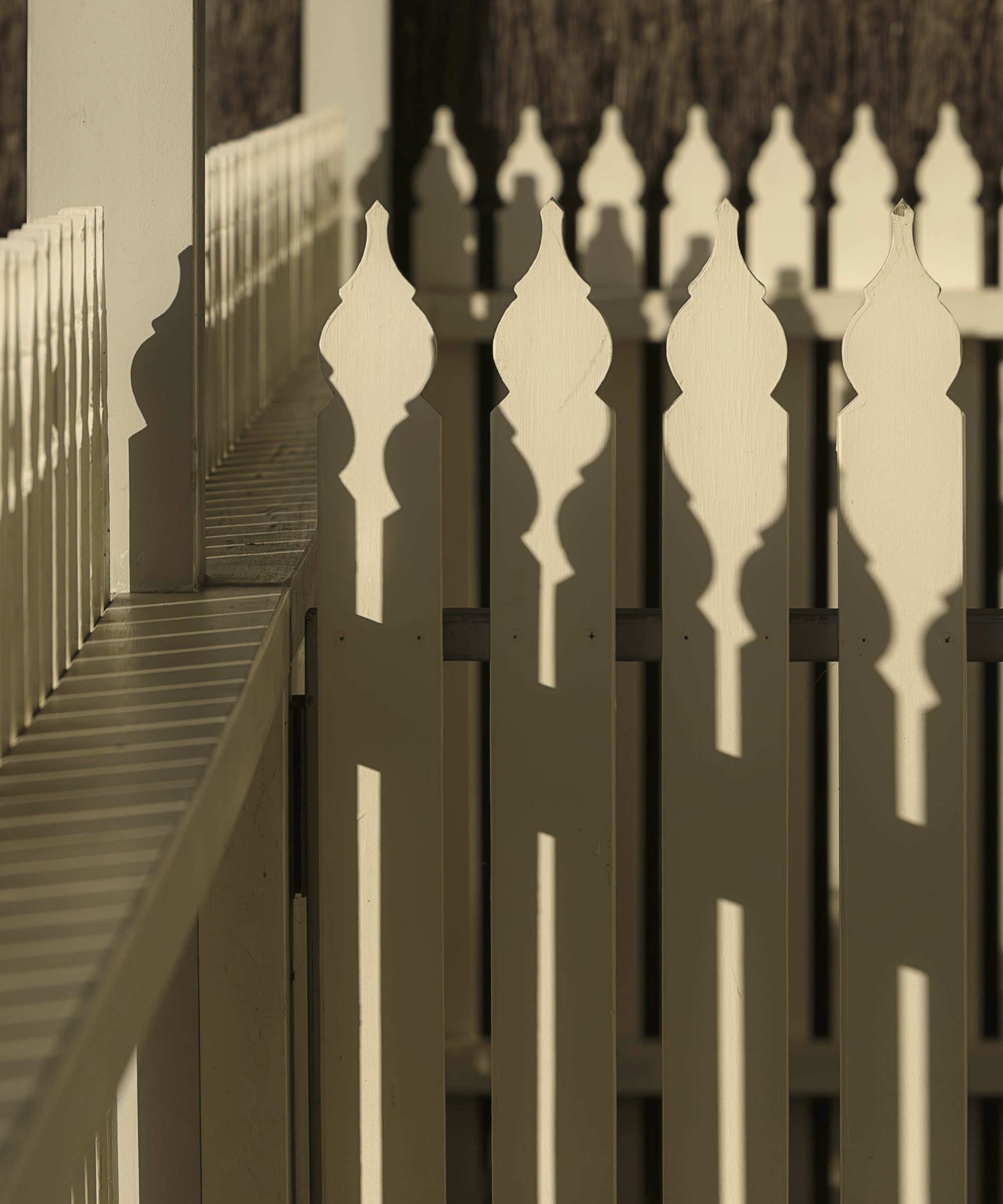 Beige fence in sunlight