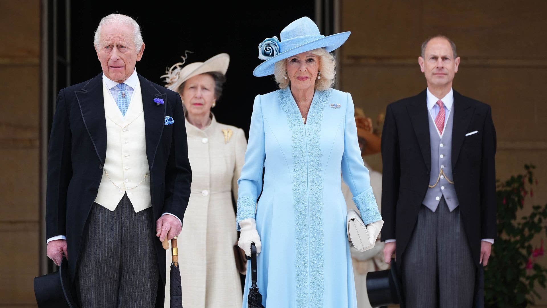 King Charles, Princess Anne, Queen Camilla and Prince Edward at the top of a flight of stairs