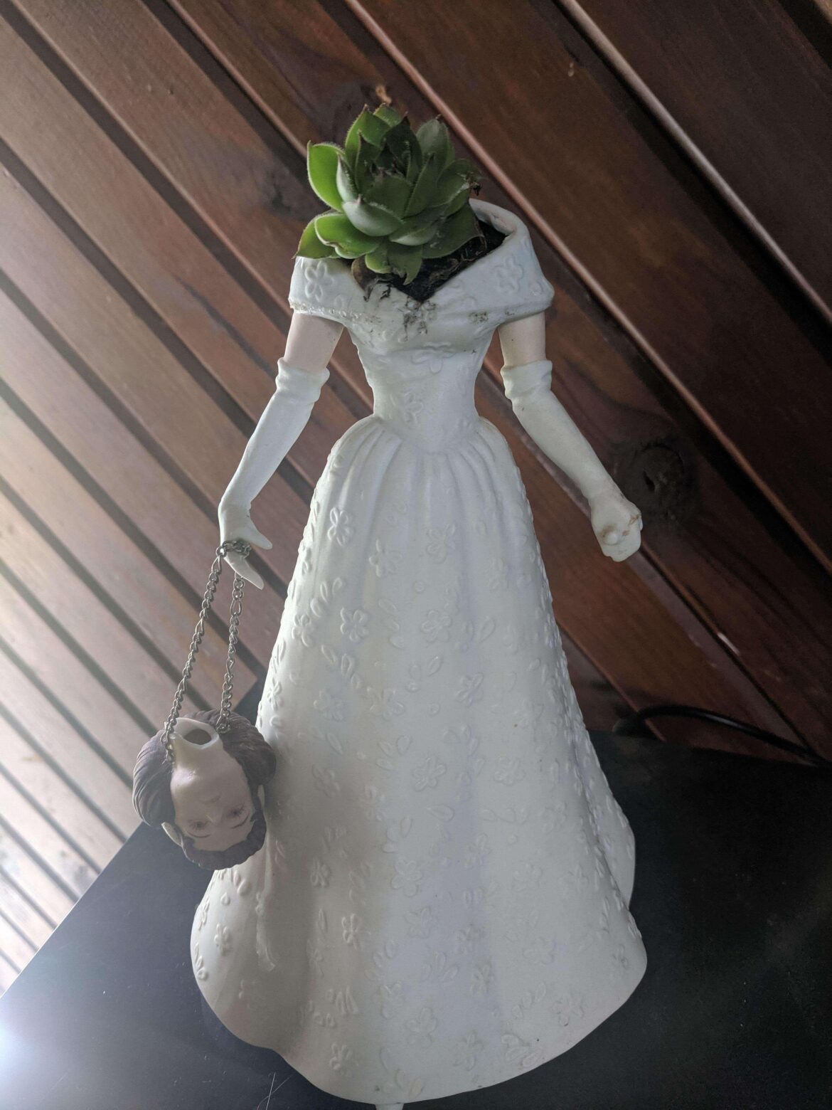 My sister brings me damaged figurines from her job. This one is my favorite.