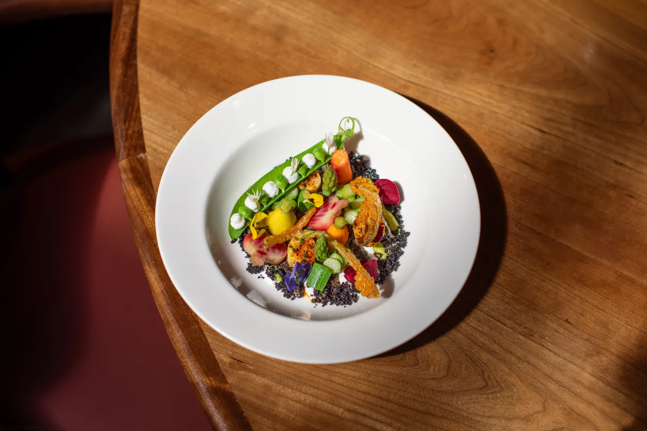 Bluebird food, including sugar snap peas, asparagus, and edible flowers, at the Bluebird restaurant in Kings Road, Chelsea, London.