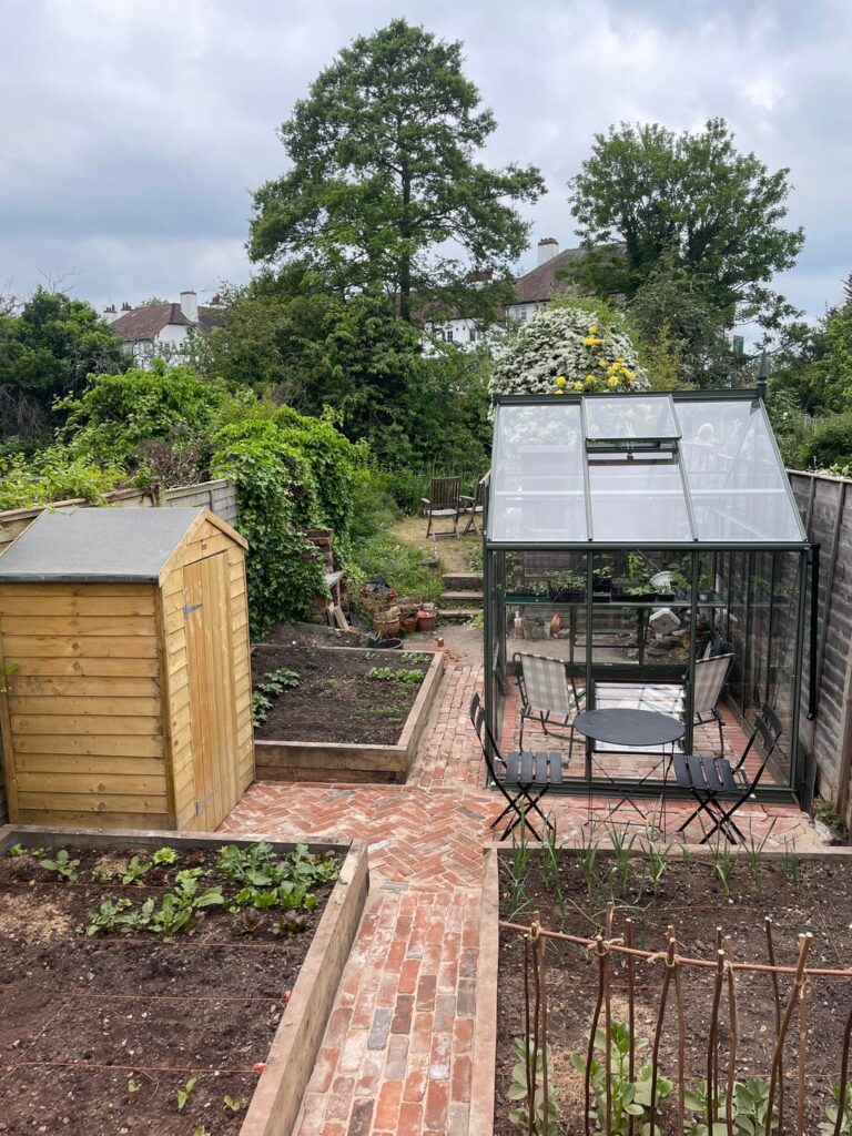Just finished creating our veg patch and greenhouse is the cherry on top