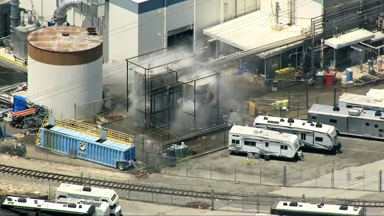 Firefighters douse the leaking chemical tank in Garden Grove on May 22, 2026. (KTLA)