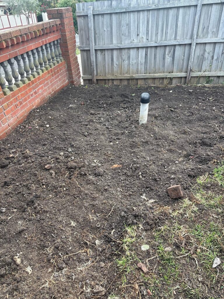 I’ve dug up all the grass, thank you excavator. Should I cardboard and top soil over this?