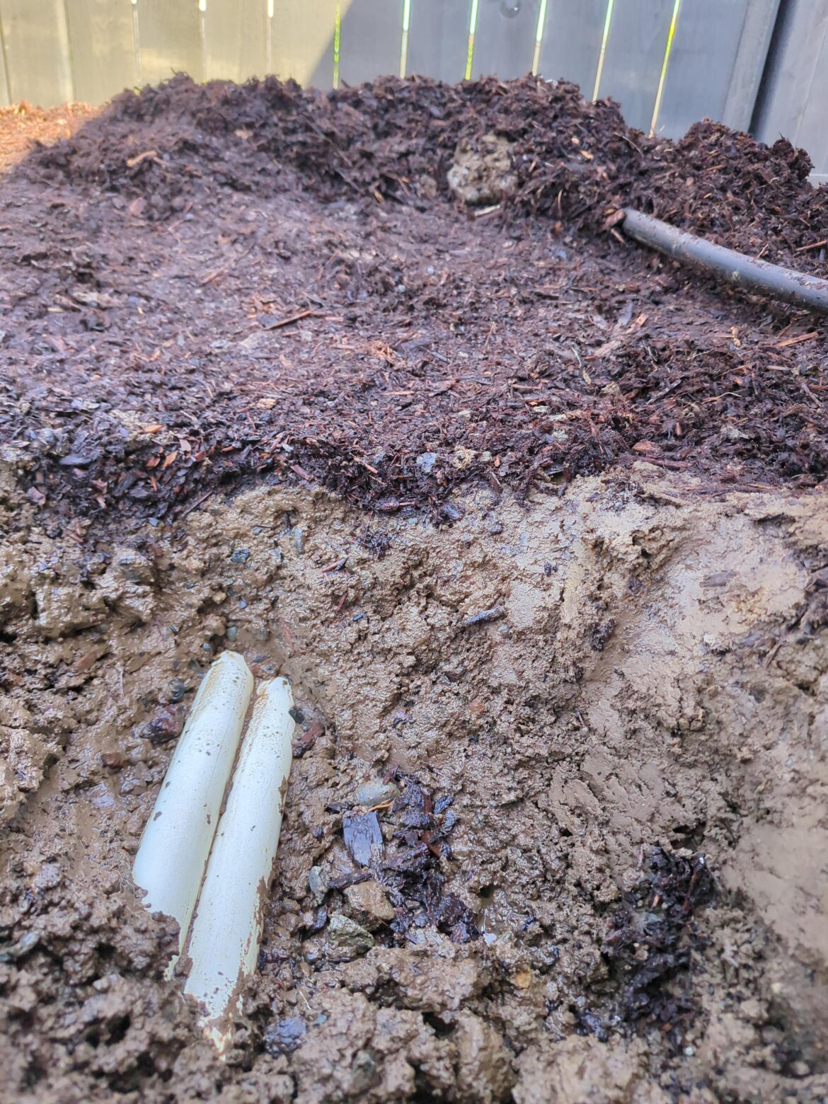 811 didn't mark anything before I started planting laurels, I found two pipes 3 inches below finished grade. House built 2024 and the builder is not responding.
